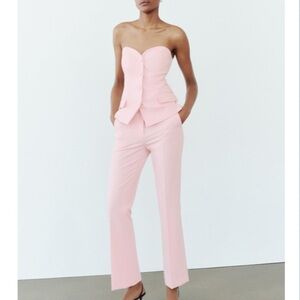 FULL LENGTH FLARED PANTS
PINK. Size L